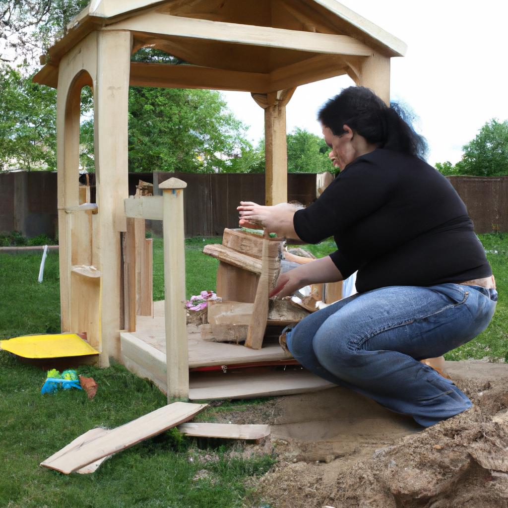 Woman building playhouse with children